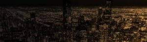 Banner image of an aerial view of downtown Chicago with a gold and black gradient